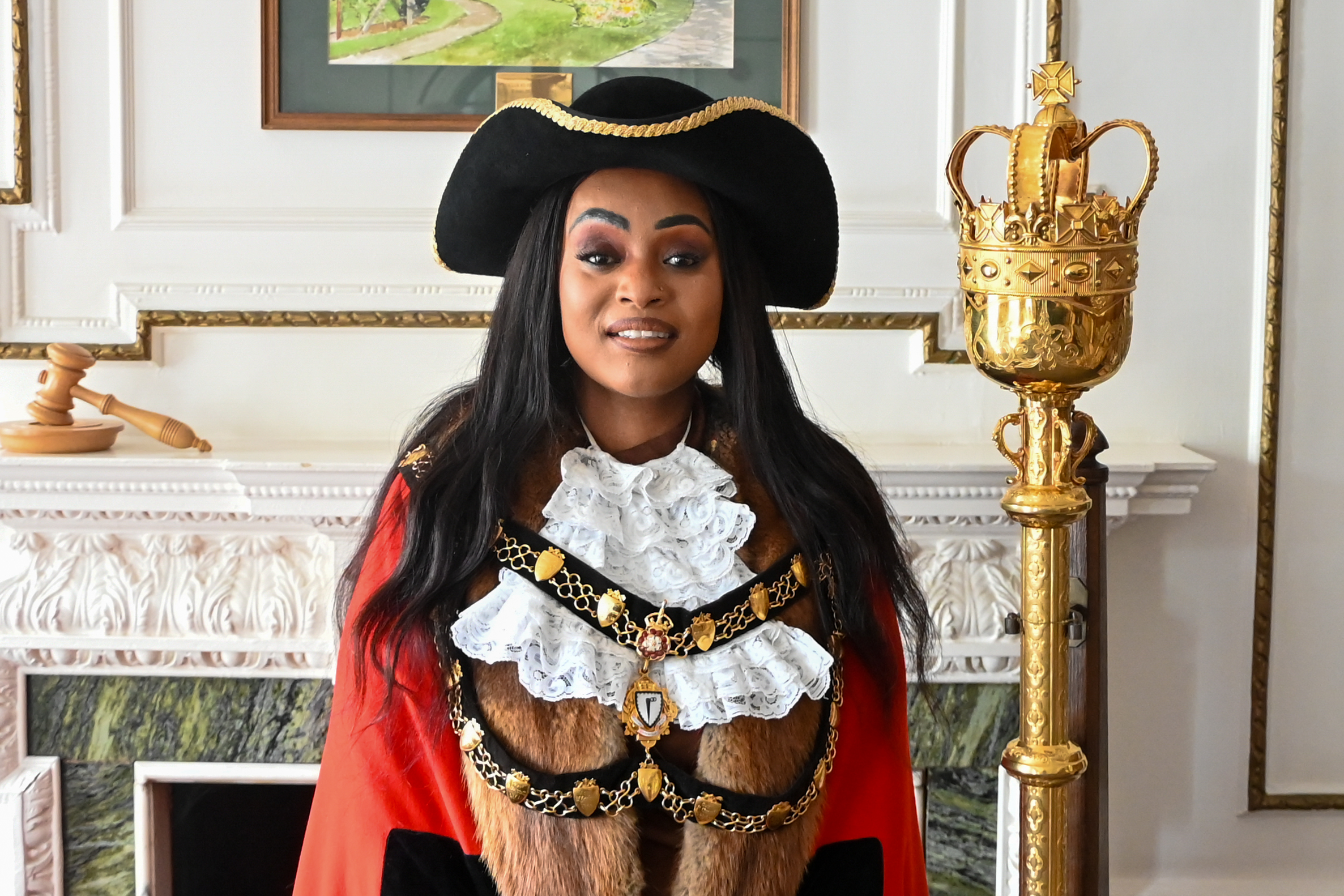 town mayor sally kimondo with full mayoral outfit and chains