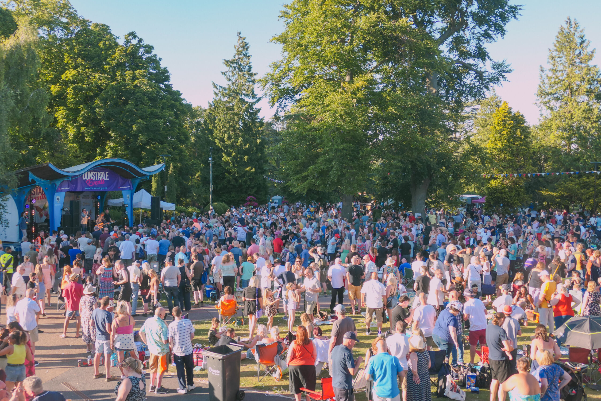 crowds of people in the park