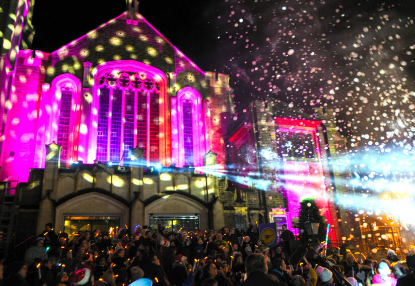 A large crowd gathered by the church for the torchlight event