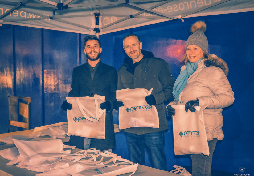 Penrose Company handing out free bags to the public