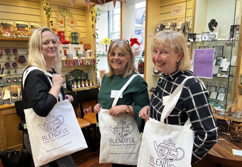 Group of people in the Tea blending workshop with their bags