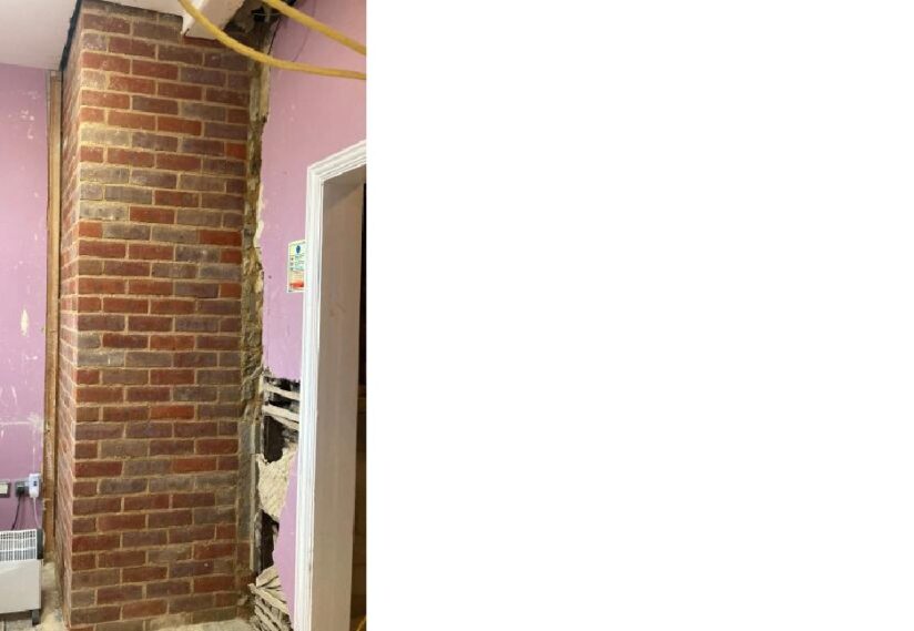 New brick work in staff room, re-establishing the corner of the original building for structural integrity.
