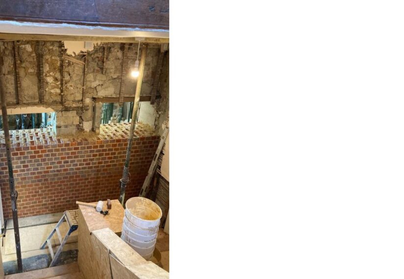 Priory House - ground floor hallway, bricking up of two openings for structural and environmental stability