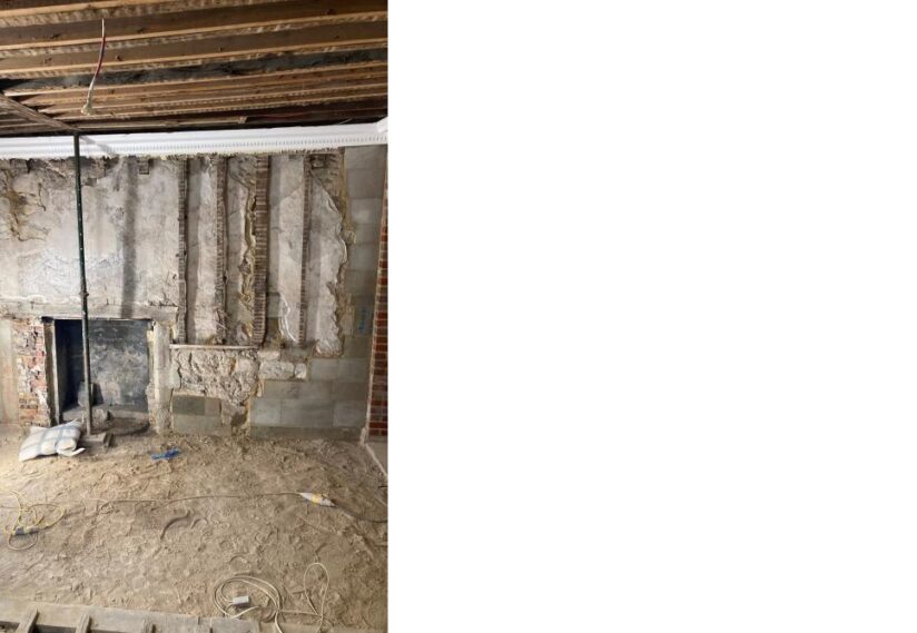 Exposed fireplace on second floor, exhibition area