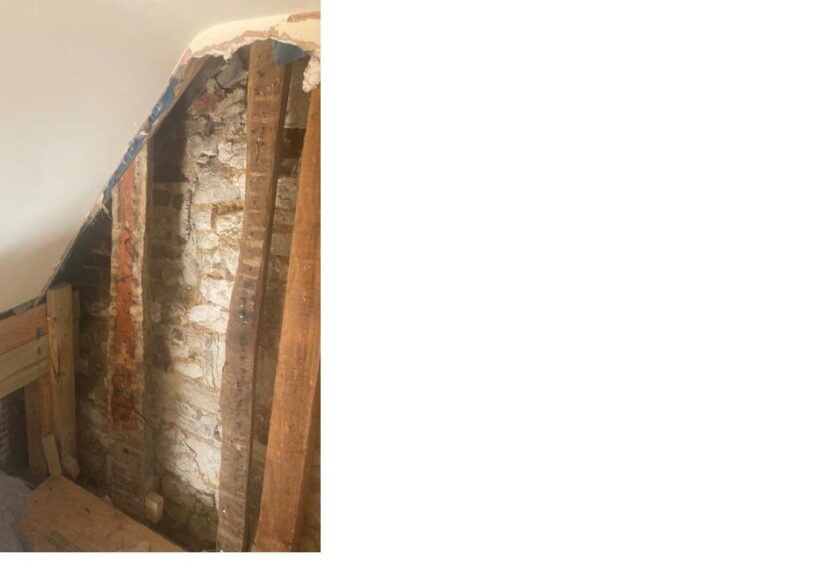 Priory House - Painted timber located on second floor, likely to have originated from another building.