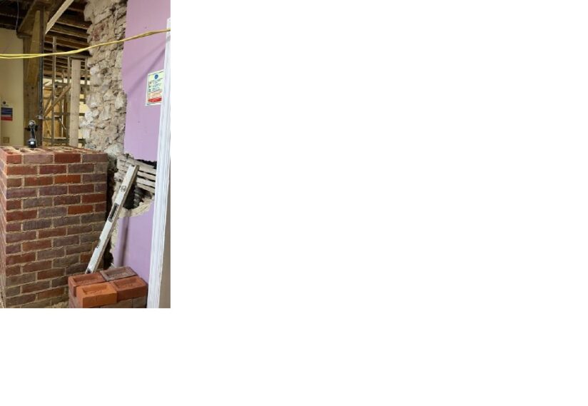 Priory House - Partial re-building of corner of original structure looking through to the exhibition area.