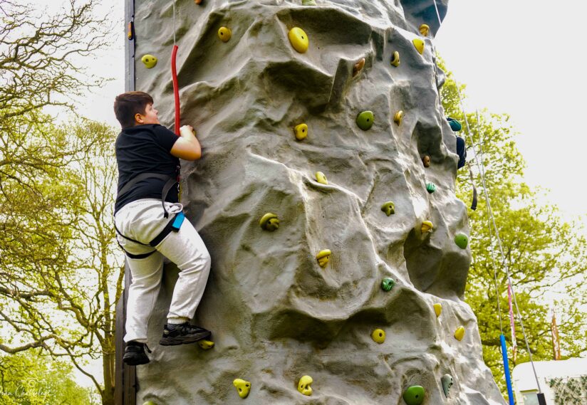 Boy rock climbing