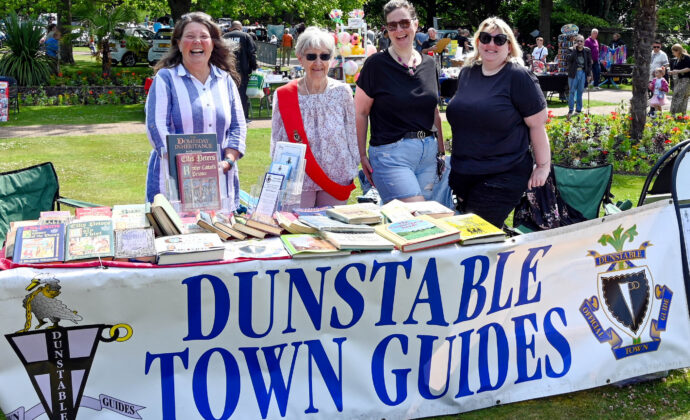 dunstable town guides behind their stall