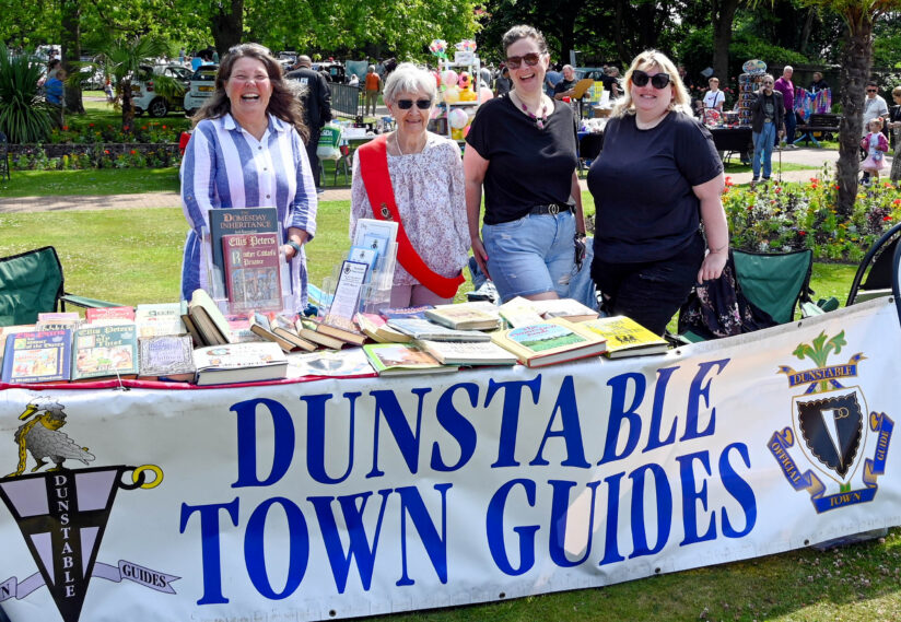 dunstable town guides behind their stall