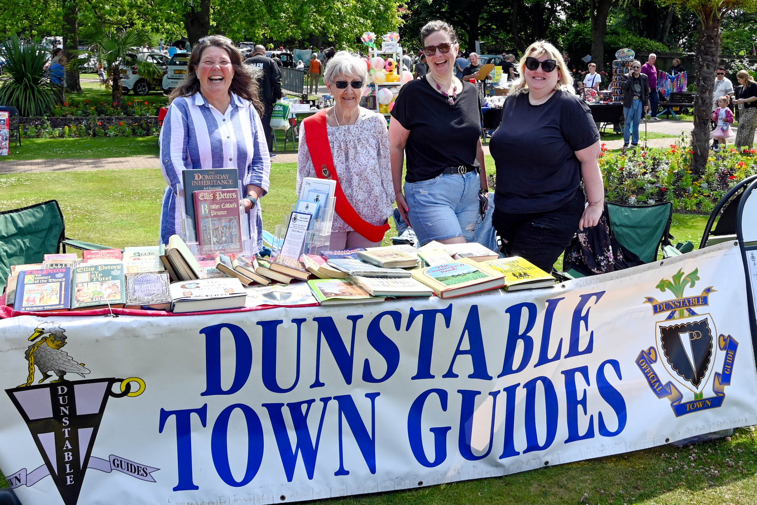 dunstable town guides behind their stall