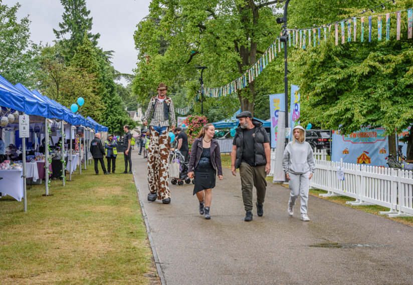 people walking down market