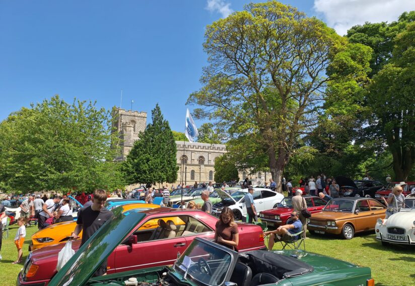 cars on the gardens in priory church